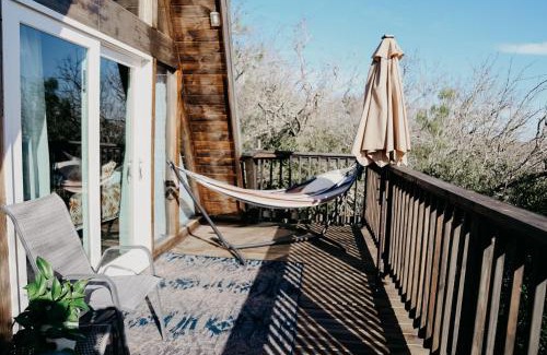 New Braunfels Ski Chalet | The Maverick: A-Frame w/Hammock and Tree Top View