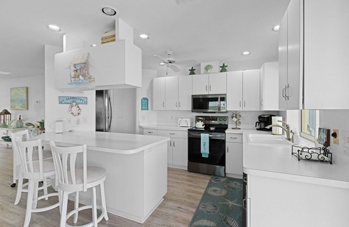 Saint James City House | The Monroe Lookout! 2/2 Pool Waterfront Home!