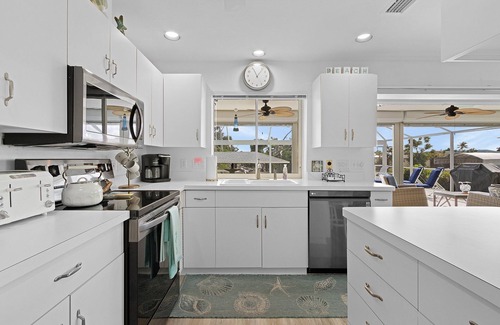 Saint James City House | The Monroe Lookout! 2/2 Pool Waterfront Home!