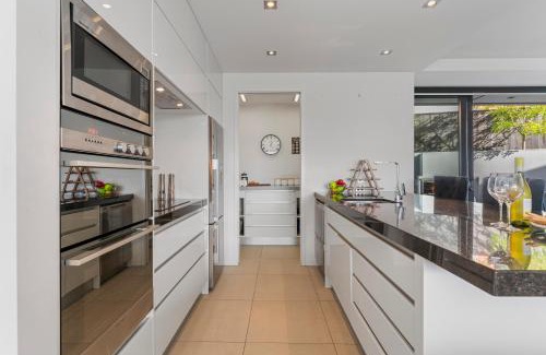 Two Mile Bay Apartment | The Moorings Apartment 5 - a stone's throw from the lake!