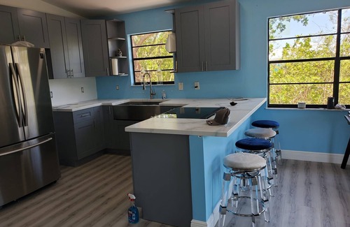 Port Pine Heights House | The most setup home in BPK TIKI HUT,POOL ,GRILL ,CANAL FRONT, FREE UNLIMITED ICE