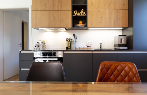 Feldwies Apartment | The new lifestyle suite on Lake Chiemsee: With a mountain view, 2 "en-suite" baths, sauna!