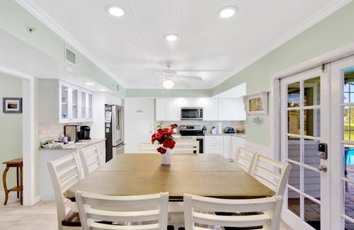 Lakeview Village House | The Oak house. HEATED Pool. Waterfront. Fire pit. Swings