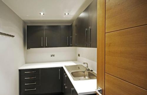 Henley House | The Oars - Riverfront Property