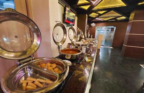 Sayajiganj Hotel | The Oasis