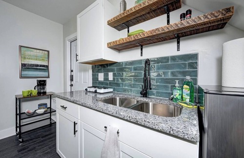 Fountain Square Apartment | The Oasis Studio is a cozy, pet-friendly vacation rental in Fountain Square, Indianapolis. Enjoy vibrant décor, modern amenities, and walkable access to live music, dining, and art. Perfect for couples or solo travelers seeking a stylish urban escape