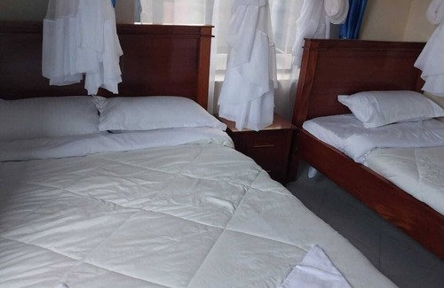 Maasai Mara Cabin | THE OGT LTD is Spacious lodge in beautiful Mara NKOILALE with WiFi access