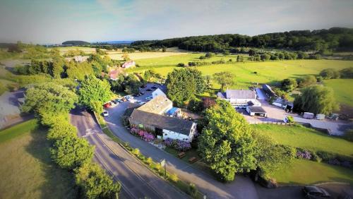 Llanmartin Hotel | The Old Barn Inn
