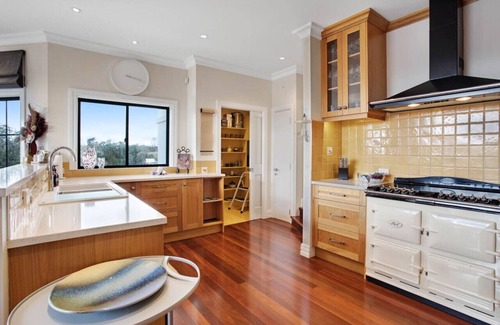 Wainui House | The Parish House with Pool, BBQ and Pizza Oven
