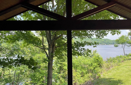 Hammond RV Rental | The Perch- Cliffside cabin with dock overlooking Black Lake