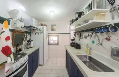 Joao Fernandes House | The perfect beach house with deck, barbecue, pool and views of the sea.