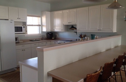 Perdido Beach House | "The Perfect Getaway" w/boat dock & water access in front & in back of house!