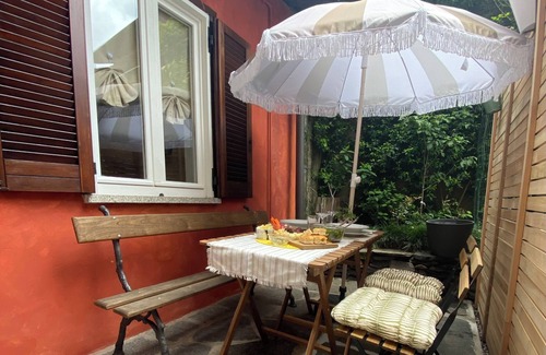 Orta San Giulio Apartment | The Pink House of Riso Amaro In the painted village Legro of Orta San Giulio