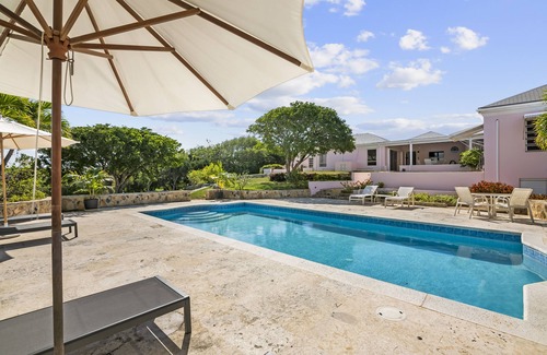 George Town House | The Pink House vacation rental, magnificent pool and view over Elizabeth harbor