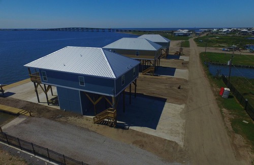 Golden Meadow House | The Pointe - Coastal Realty Group