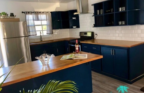 Dickenson Bay House | THE RADCLIFFE - Luxury townhome 7 mins walk to Beach, restaurants, bars.
