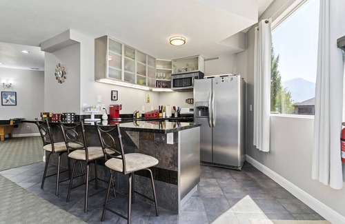 North Ogden Apartment | The Rec Room is a basement apartment with game tables, theater, hot tub & more!