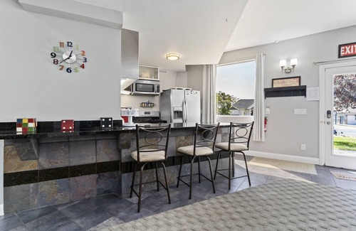 North Ogden Apartment | The Rec Room is a basement apartment with game tables, theater, hot tub & more!