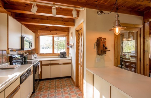 Ludlow House | The Red Bridge House. 360° of lake views.