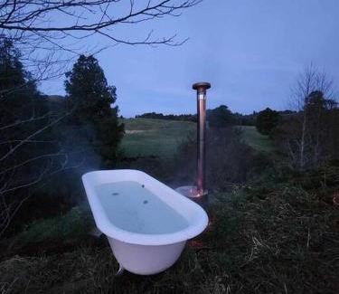 Te Anga Villa | The Rimu Hut - Off-grid Luxury riverside cabin