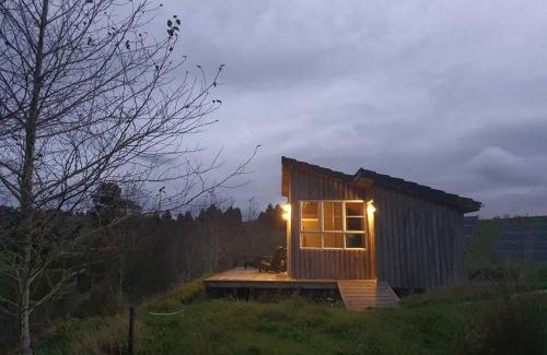 Te Anga Villa | The Rimu Hut - Off-grid Luxury riverside cabin