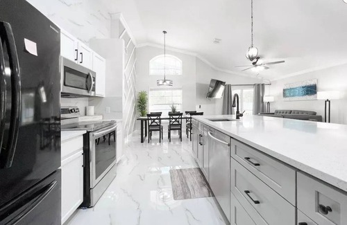 Westridge House | The Ritz Vacation - Near Disney - Heated Pool