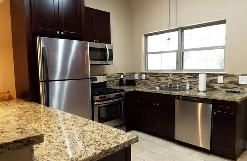 Kyle House | "The Rosewood" little bit country, close to town, new, clean and fresh.