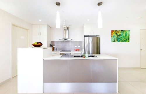 Darwin City Centre Apartment | The Smith A Vibrant Poolside Balcony Haven