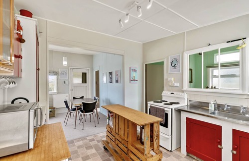 Foxton Beach Cottage | The Smurf Shack - Renovated Retro Gem with Awesome Outside Living.