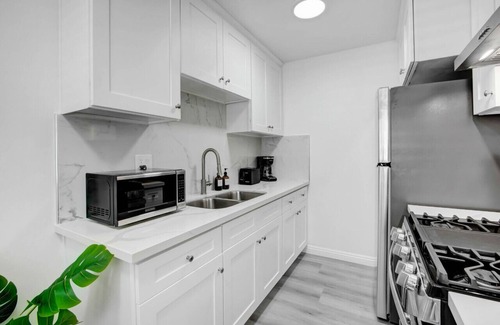 Rosemead Apartment | The Soothing Alcove King bed