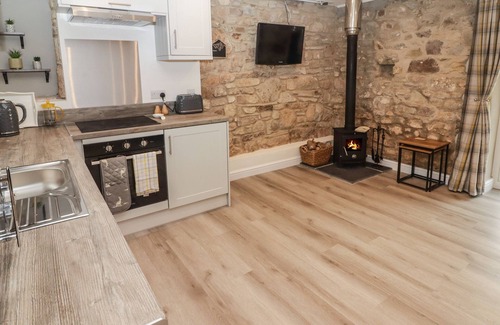 Tavernspite Cottage | THE STABLE, romantic, with open fire in Amroth