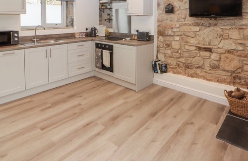 Tavernspite Cottage | THE STABLE, romantic, with open fire in Amroth