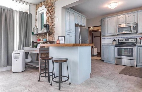 Hermann House | The Stone Cottage, The Stone Cottage is a beautiful, spacious 3 bedroom, 3 bath house