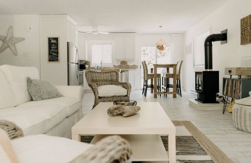 Bayfield Cottage | The Sugar Shack family retreat w arcade & hot tub. Walk to Main St. and Beach