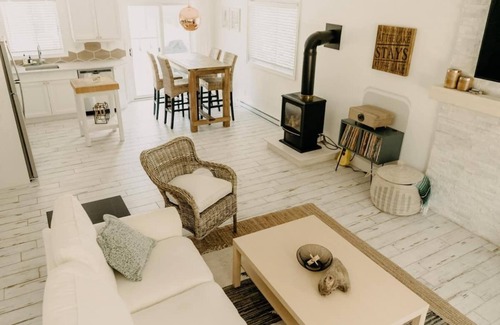 Bayfield Cottage | The Sugar Shack family retreat w arcade & hot tub. Walk to Main St. and Beach