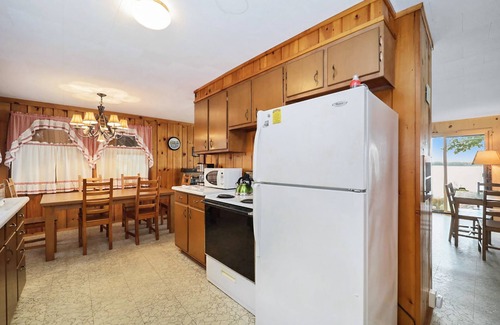 Interlochen House | The Summer Cabin | Lakefront house in Interlochen with private beach access