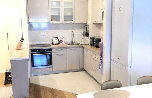 Bar Apartment | The SunshineLiving apartment is a 10-minute walk from the beach.