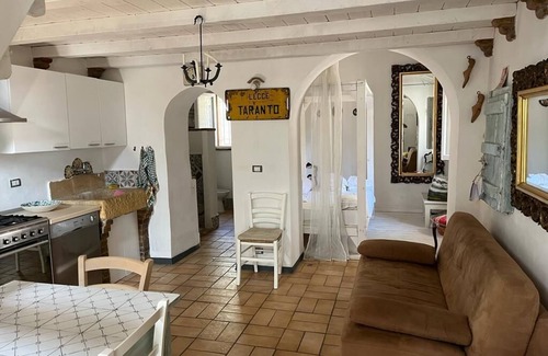 Pisticci House | The Three Arches: house nestled among olive trees in the Lucanian countryside.