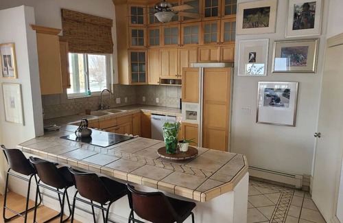 Sunset Heights House | The Treehouse: Spacious Retreat with Theater Room, Fire Pit & Mountain Views