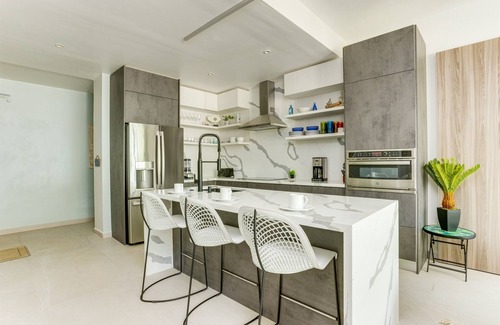 Cocoplum Condo | The Villas at Cocoplum'Trigger Fish' Apartment 112