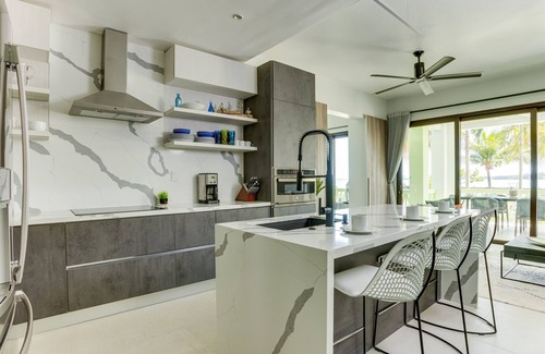Cocoplum Condo | The Villas at Cocoplum'Trigger Fish' Apartment 112