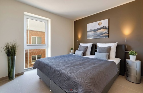 Kappeln Apartment | The Wave: luxury holiday apartment right on the water with heated lounger, sauna and fireplace