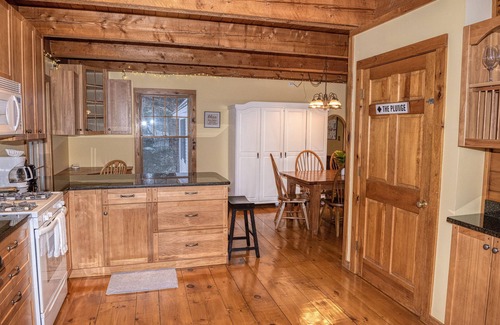Belmont Ski Chalet | The Whimsical Chalet is a lovely cape on acres. Private setting less than 10 minutes to skiing.