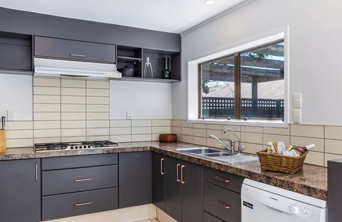 Turangi House | The Whio Retreat - Secluded Retro Riverside Getaway w/Pool & Hot Tub.