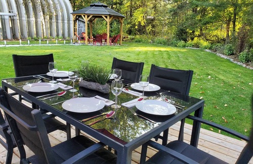 Lake St. Peter Cottage | The Wooded Oasis - Cozy Winter Cottage w/Hot Tub & Sunken Firepit