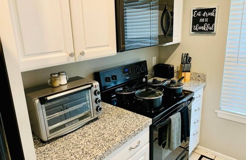 Panther Creek House | The Woodlands House 3 Bed, 2 Baths, FREE Parking Garage, Baby Crib, Kitchen