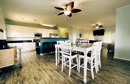 Hackberry House | "The Yellowfin" trophy speckled trout, redfish and flounder fishing.