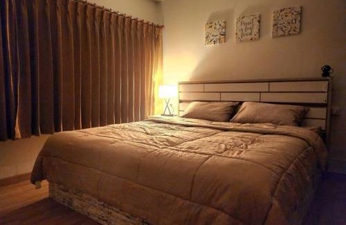 Ban Mai Apartment | ThePeachRoomที่พักใกล้อิมแพคเมืองทอง เตียงควีนไซส์