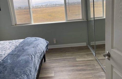 Imperial Beach Condo | Third story condo with tiny beach view. Across from ocean and on estuary.