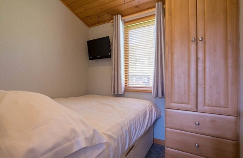 Knott End-on-Sea Cabin | This beautiful traditional lodge situated within a woodland setting is the perfect location for you